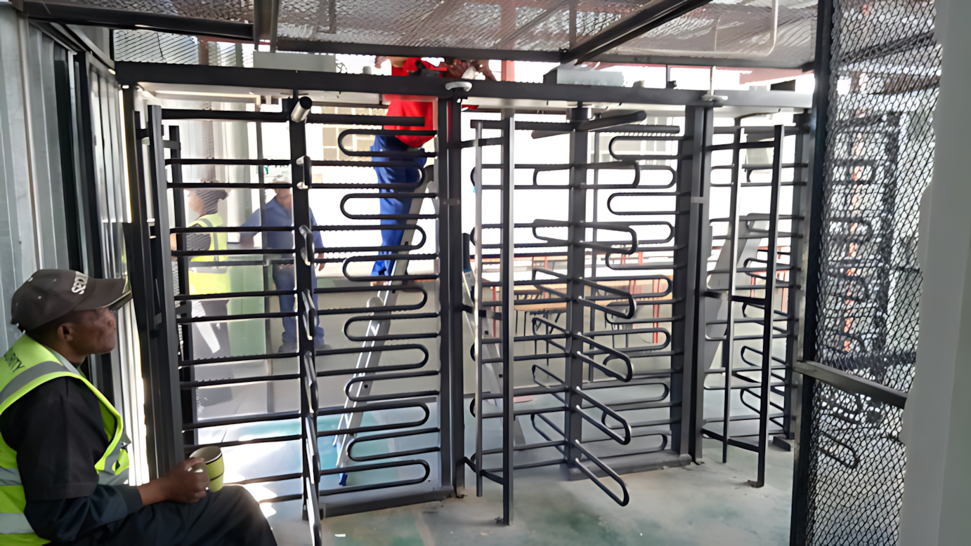 Photo of three industrial turnstiles